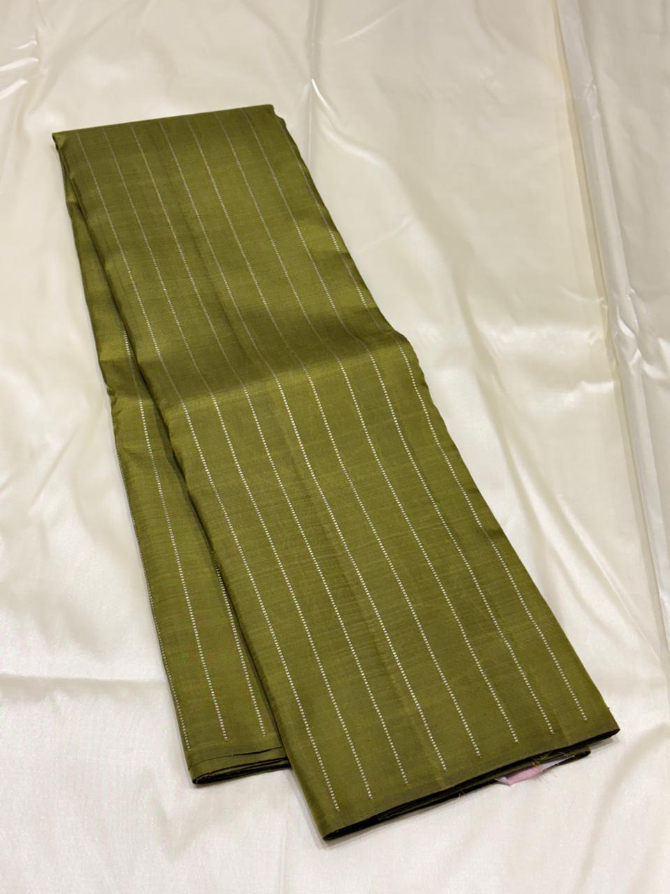 Silk Mark certified pure silk saree in green with contrast pink pallu