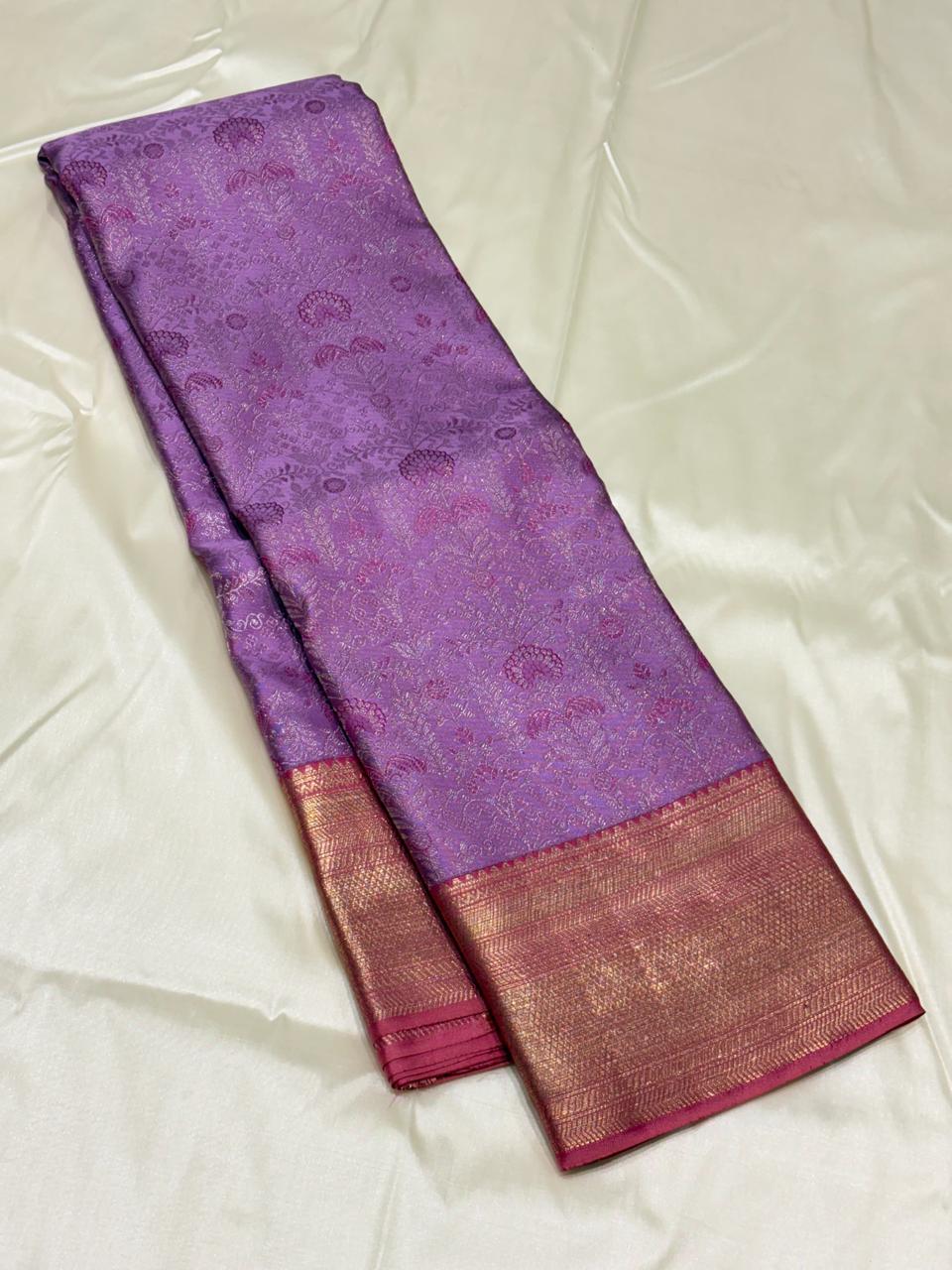 Elegant purple and pink Kanchipuram silk saree with zari craftsmanship