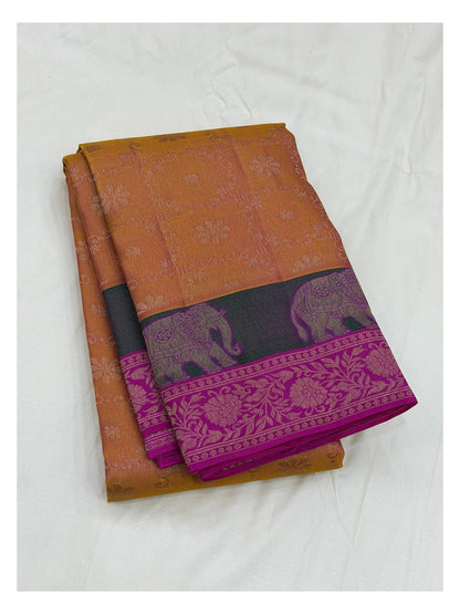 Mustard pure silk saree with magenta floral border and elephant motif detailing