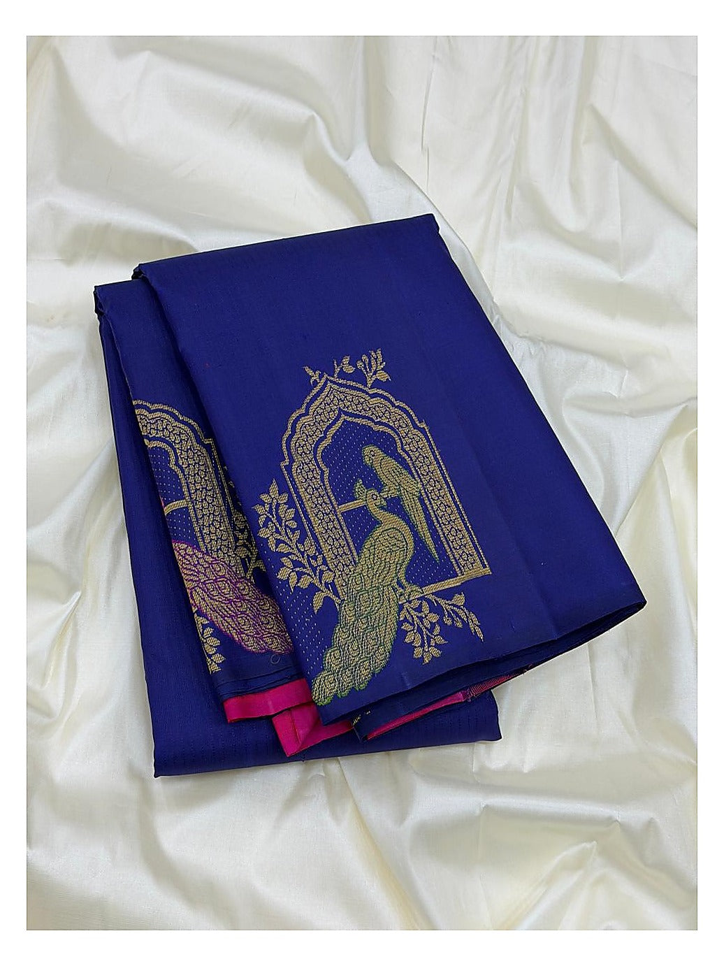Royal Blue Handwoven Kanchipuram Silk Saree with Gold Peacock Motifs and Contrast Coral Pink Pallu