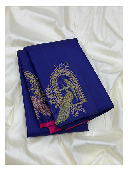 Royal Blue Handwoven Kanchipuram Silk Saree with Gold Peacock Motifs and Contrast Coral Pink Pallu