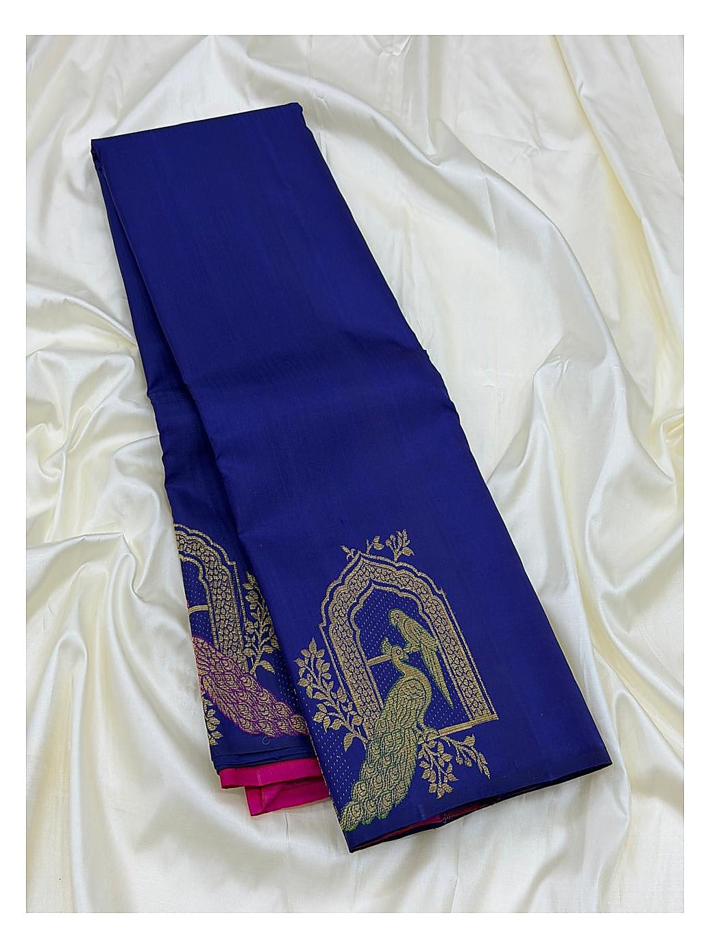 Royal Blue Handwoven Kanchipuram Silk Saree with Gold Peacock Motifs and Contrast Coral Pink Pallu