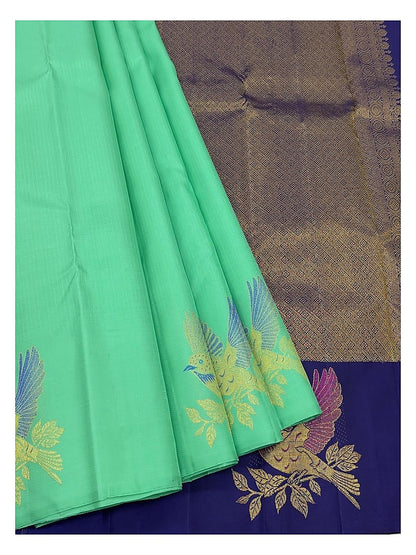Royal Blue Handwoven Kanchipuram Silk Saree with Mint Green Bird Motifs and Contrast Mint Zari Border front view