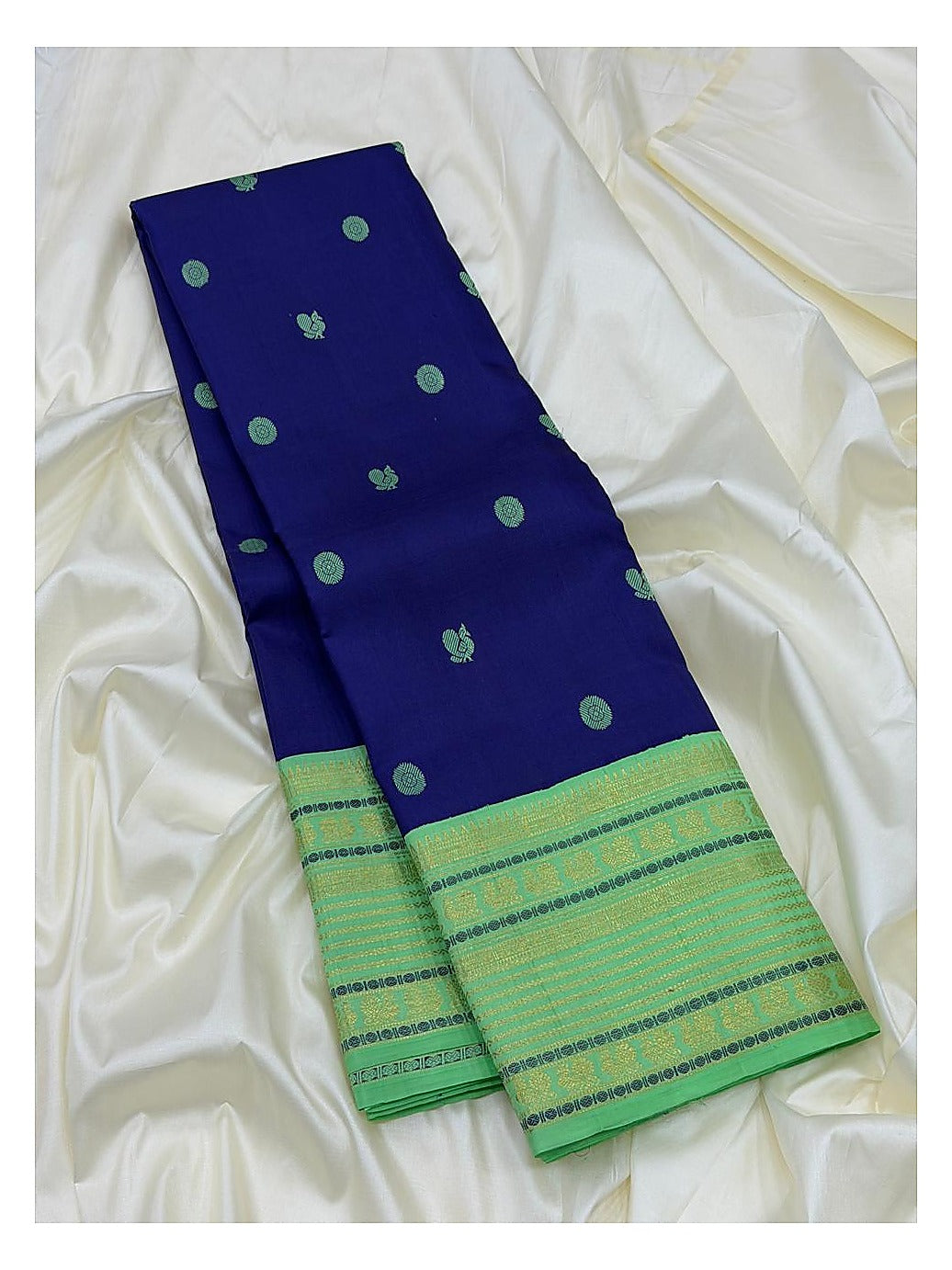 Royal Blue Handwoven Kanchipuram Silk Saree with Mint Green Bird Motifs and Contrast Mint Zari Border