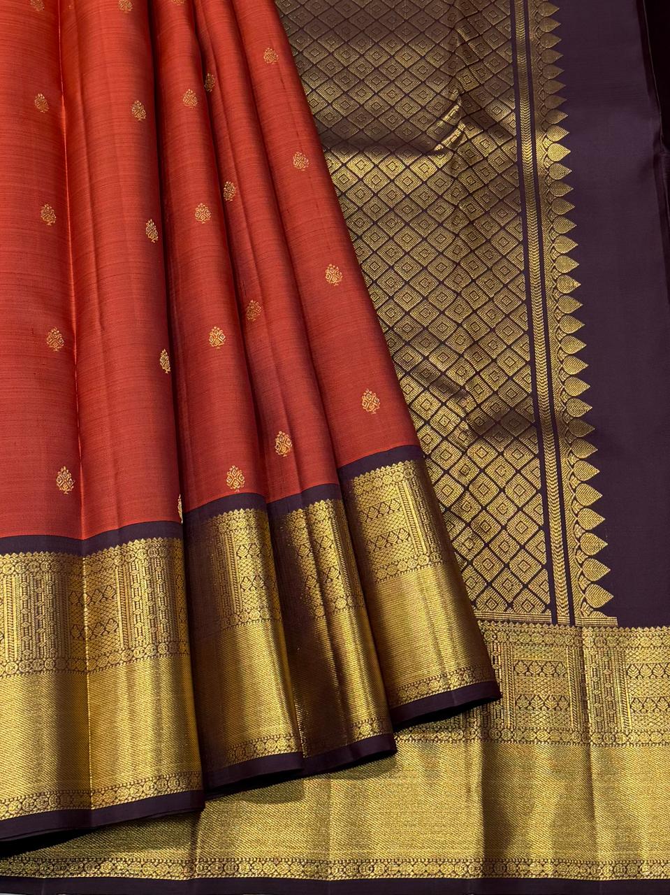 Handwoven pure silk saree with gold buttas and temple zari motifs
