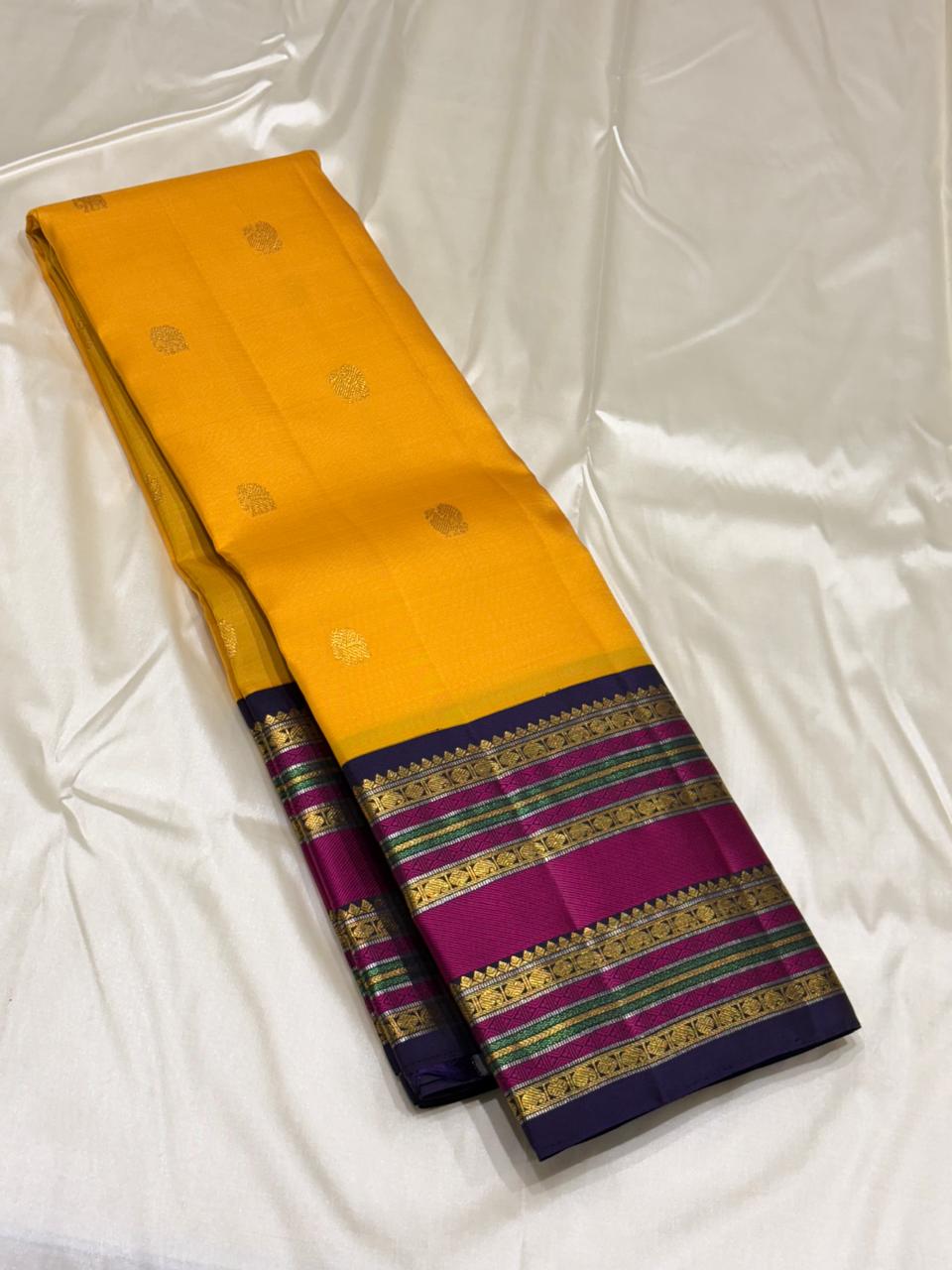 Silk Mark certified mustard yellow Kanchipuram saree with traditional border