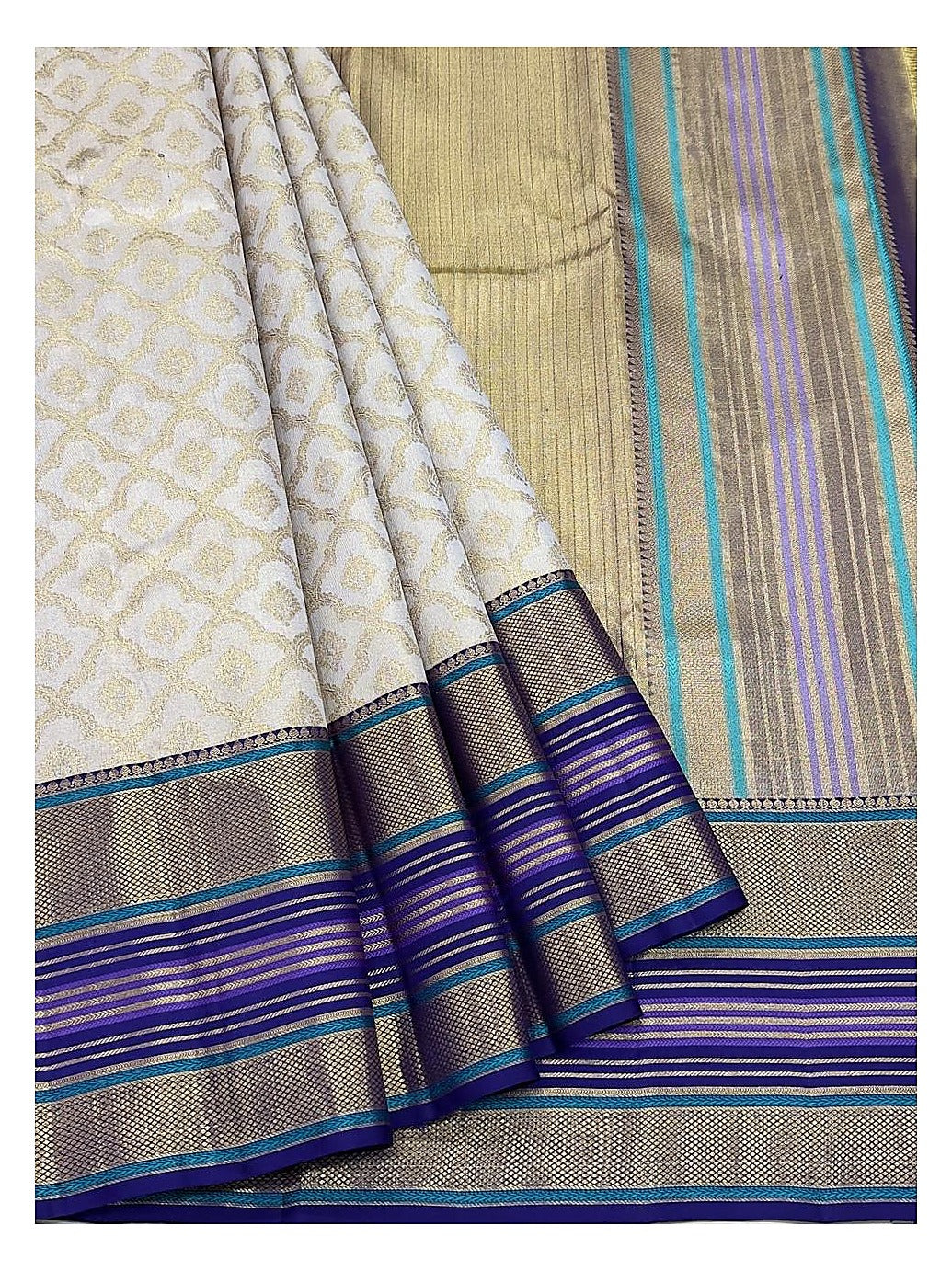 Soft Ivory Handwoven Kanchipuram Silk Saree with Gold Floral Motifs and Blue Purple Contrast Pallu front view