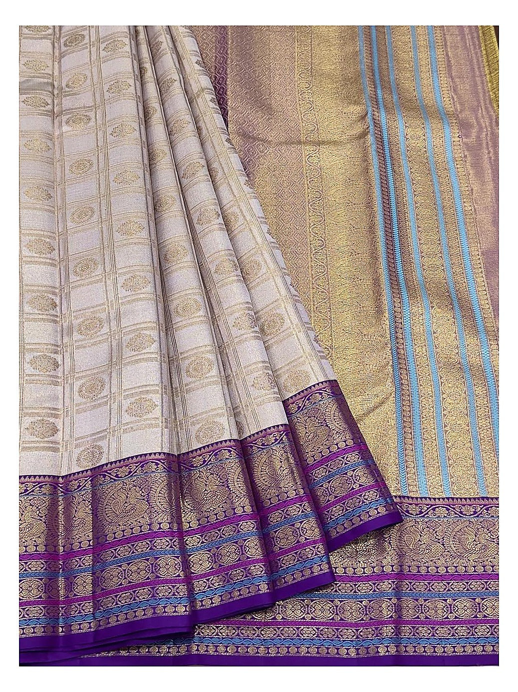 Soft Ivory Handwoven Kanchipuram Silk Saree with Purple Peacock Zari Border front view