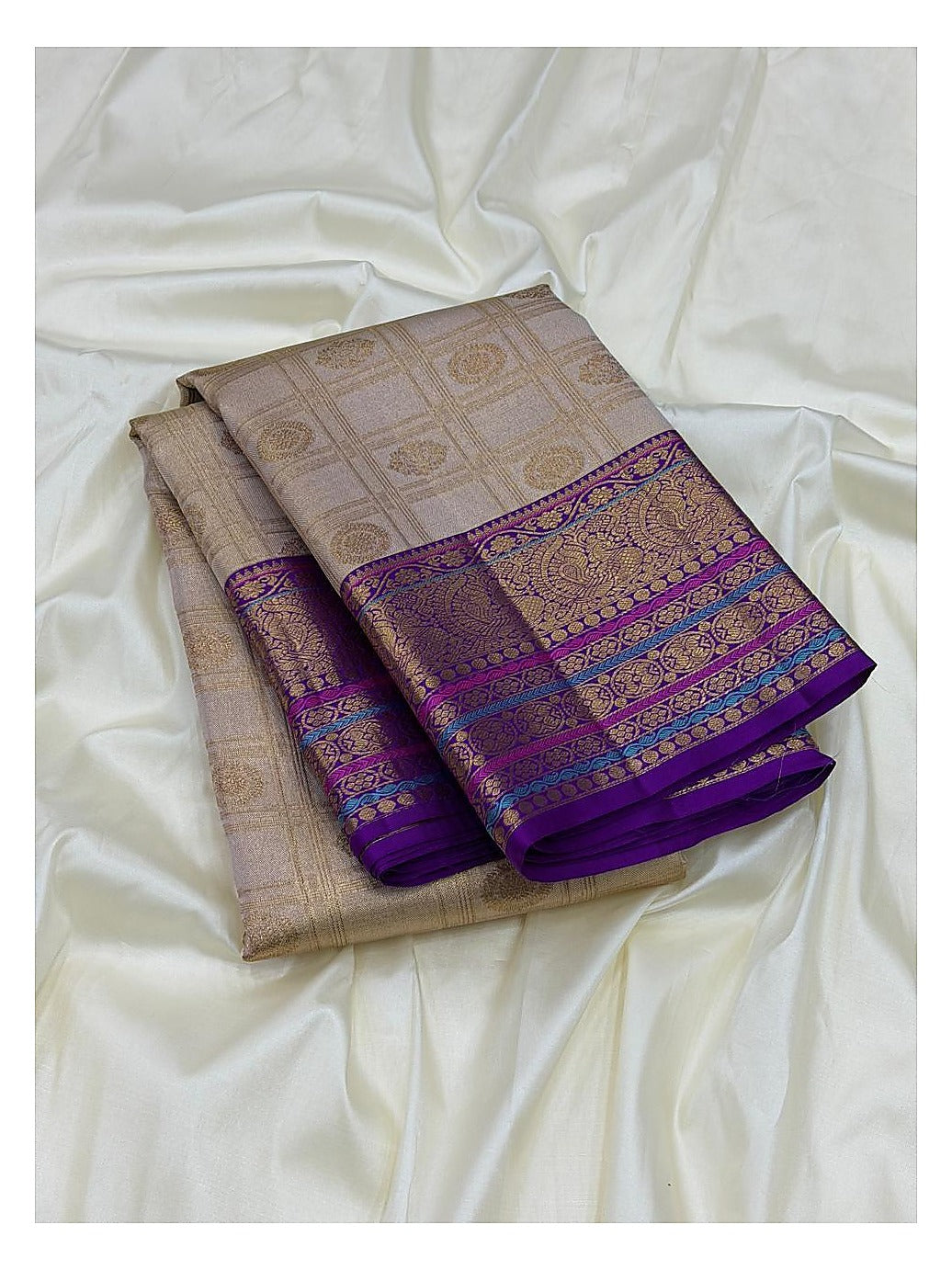 Soft Ivory Handwoven Kanchipuram Silk Saree with Purple Peacock Zari Border