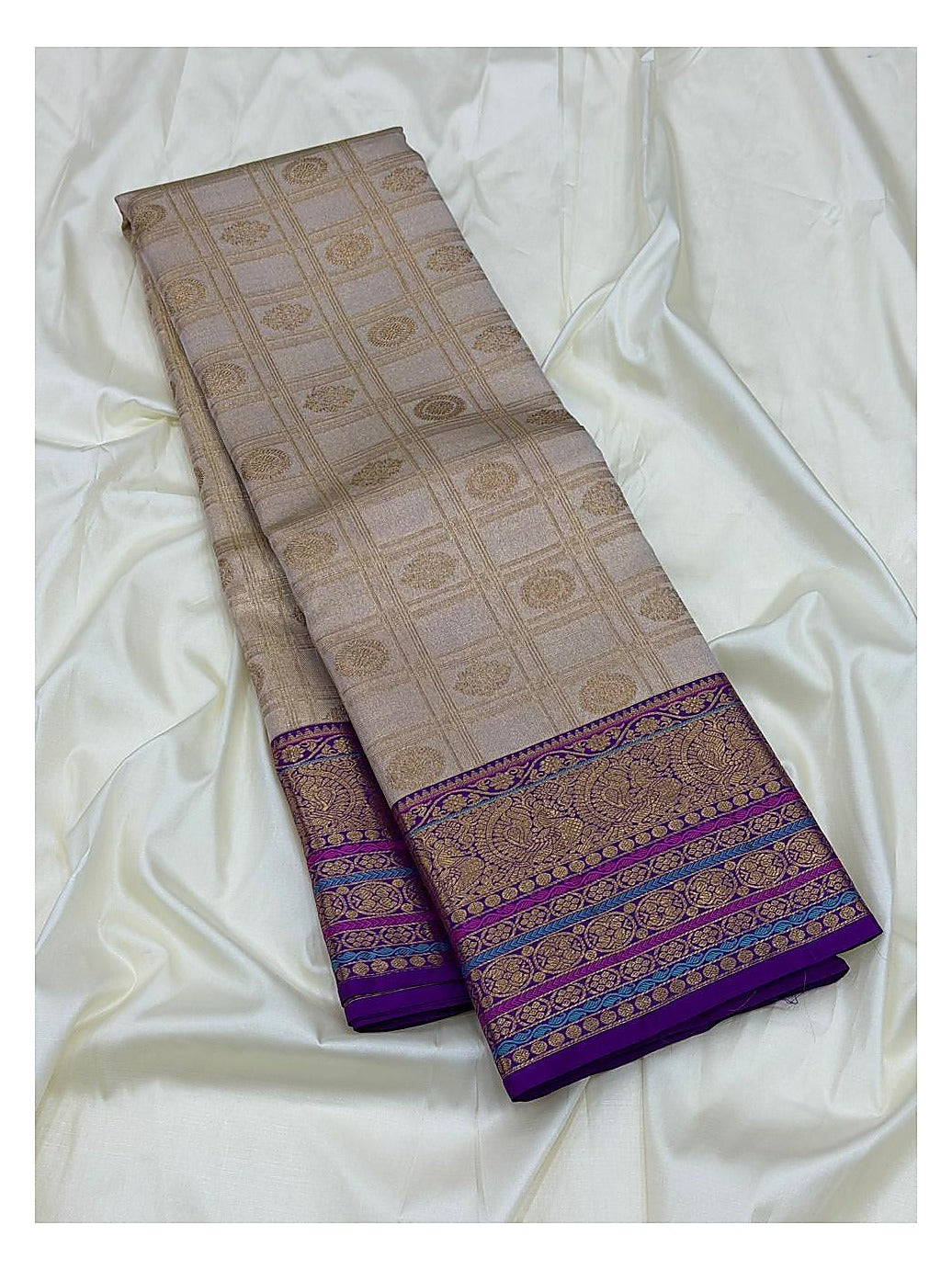 Soft Ivory Handwoven Kanchipuram Silk Saree with Purple Peacock Zari Border
