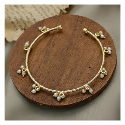 Textured Pearl Bangle - Gold Tone Open Cuff with Pearl Charms front view