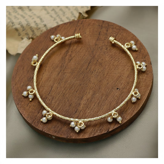 Textured Pearl Bangle - Gold Tone Open Cuff with Pearl Charms front view