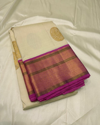 Silk Mark Certified ivory and magenta saree for festive occasions