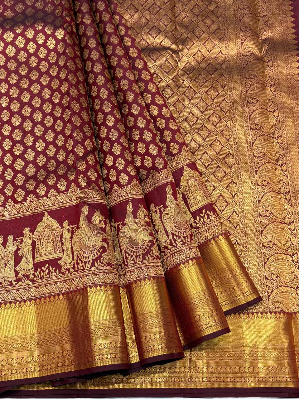 Maroon Kanchipuram silk saree with zari wedding procession border – full view